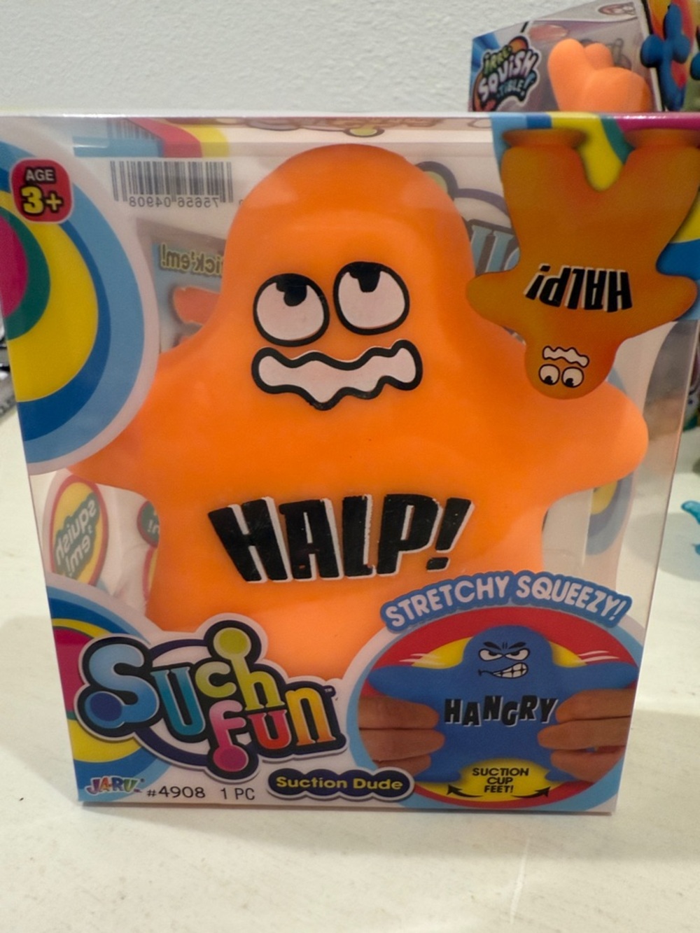 HALP! Ja-Ru Orange Stretchy Squeeze Toy